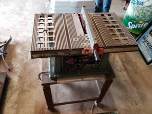 lot 300 image: 10 DELTA table saw with stand