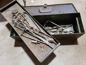 lot 304 image: vintage toolbox with an assortment of shelving brackets