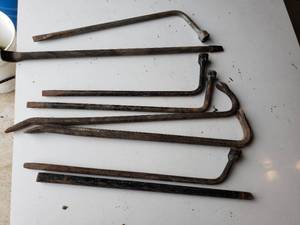 lot 314 image: assortment of tire wrenches and pry bars