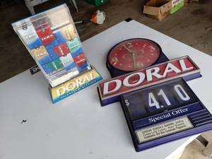 lot 383 image: DORAL clock and store advertising