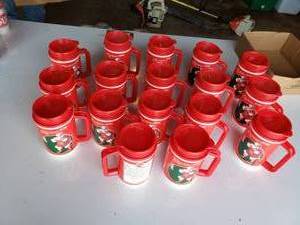 lot 390 image: (17) new Coca Cola 1996 christmas insulated santa mugs