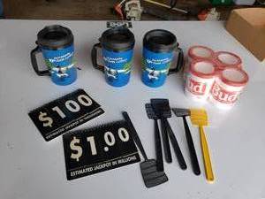 lot 392 image: NEW in the package 4 pack of BUDWEISER can coozies ,MN lottery mugs and more