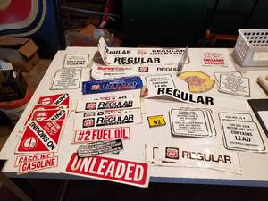 lot 434 image: numerous gas pump fuel brand and grade stickers