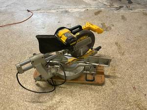 lot 31 image: DeWalt DW708 12 Sliding Compound Miter Saw