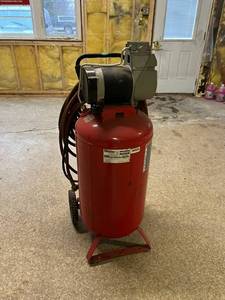 lot 50 image: Porter Cable Model C6110 Air Compressor & Hose