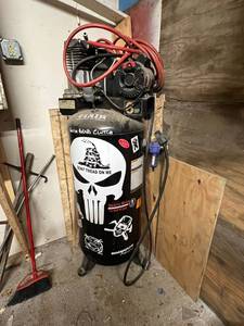 lot 3 image: Coleman Powermate 60 Gallon Air Compressor