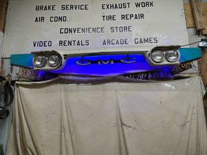 lot 114 image: Lighted Vintage GMC Vehicle Front End