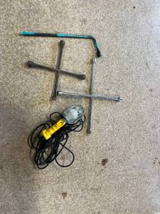 lot 134 image: Tire Irons & Shop Light