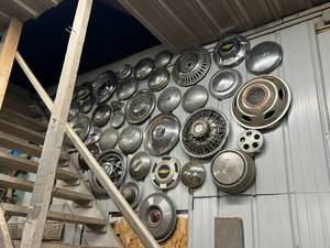 lot 169 image: Wall of Hubcaps