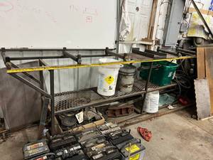lot 192 image: 12 Long Shop TableWelding Stand With Rollers
