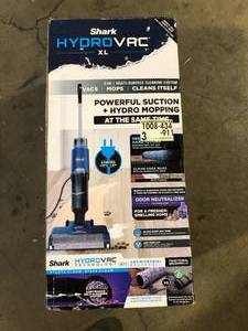 lot 31 image: Shark HydroVac XL 3-in-1 bagless corded stick vacuum, mop and self-cleaning system for hard floors and area rugs WD101  Customer Returns See Pictures