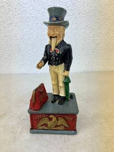 lot 1 image: Cast Iron Uncle Sam Bank