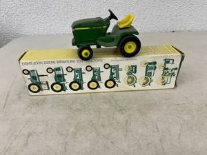 lot 34 image: Miniature John Deere Toy Tractors