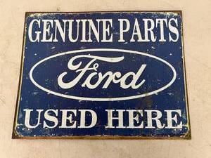lot 177 image: Genuine Ford Parts Used Here Metal Sign