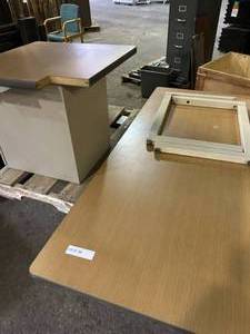 Cubicle desk with Steel free standing legs, an office Cabinet, big table, and small table