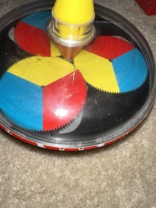 lot 30 image: Vintage Spinning Push and Spin Toy, Plastic & Metal 10