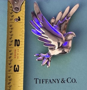 lot 48 image: Tiffany & Co.  Paloma Picasso Sterling Silver Large Dove Brooch