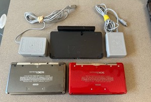 lot 108 image: Lot of 2 Nintendo 3DS  CRT-001 RED AND GREYBLACK