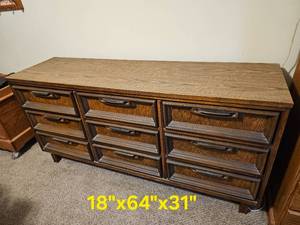 lot 9 image: Mid Century Nine-Drawer Dresser from Bassett Furniture