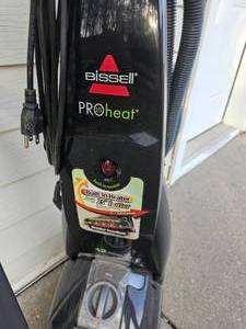 lot 104 image: Bissel Carpet Cleaner