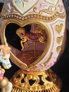 lot 91 image: Porcelain Egg Carousel Horse Collection