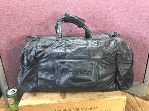 lot 17 image: Black Leather Duffle Bag with Texaco Monogram