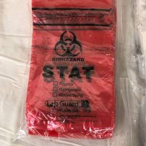lot 39 image: Lot of Biohazard Specimen Waste Transportation Bags (Lab Guard, Medline)
