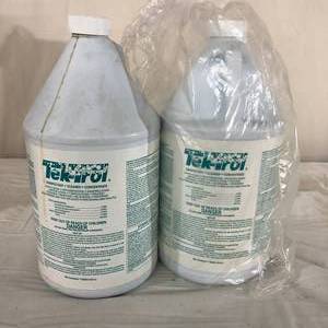 lot 82 image: Lot of 2 NEW Bio-Tek 1-Gallon Tek-Trol Disinfectant Concentrate Cleaner -strong cleaningdisinfecting concentrate is excellent for school use, cattle ranches, aviaries, swine producing facilities, equine facilities & calving operations. 