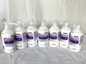 lot 193 image: Lot of 7 NEW ECOLAB 6059323 540mL Fragrance Free Revitalizing Skin Lotion - Expiration 923