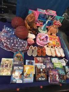 lot of kids toys, books and shoes