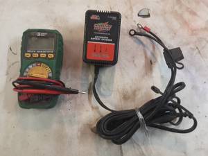 Interstate battery chargermaintainer and digital multimeter