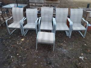 5 matching patio chairs and one foot rest