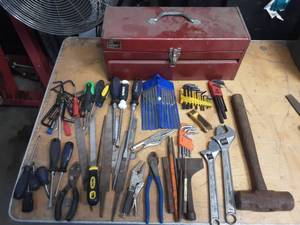 tool box full of assorted hand tools