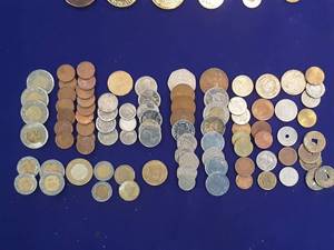 Assorted foreign coins.