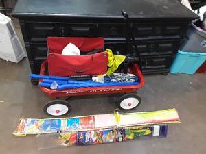 radio flyer wagon, 2 kites, volleyballbadminton set