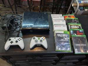 Xbox 360 consol, power and AV cables, controllers, games