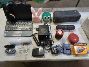 ASUS notebook (no charger) bluetooth speakers, tattoo machine, cameras more