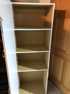 lot 67 image: 4 Tier Particle Board Cabinet