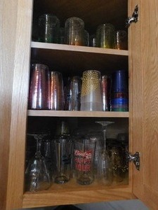 lot 127 image: Cupboard Full of Glasses