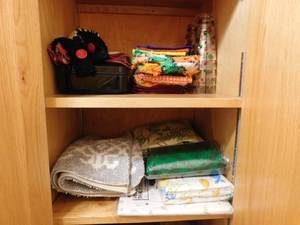 lot 401 image: Closet full of Rugs, Towels etc.