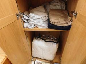 lot 402 image: Closet full of Sheets