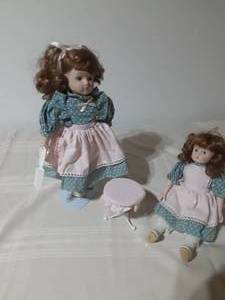 lot 195 image: Porclean doll set