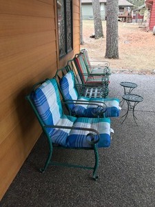 lot 521 image: 5 Metal Outdoor Patio Chairs with Cushions & 2 Small Tables (1 chair is missing a cushion)