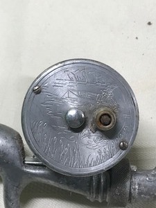 lot 582 image: Vintage Steel fishing rod and reel