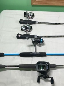 lot 583 image: 4 Fishing rods and reels and a lure
