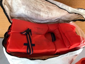 lot 637 image: Safety gear bag full of life jackets and 2 flare shooting pistols in case