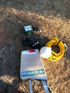 lot 677 image: Electric Weed roller for Cleaning out Weeds Out of lakefront..