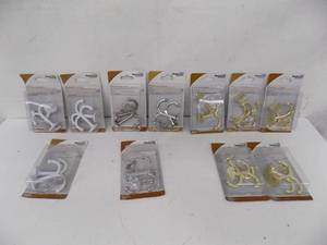 lot 66 image: 11 Undershelf Coat Hooks (National Hardware)
