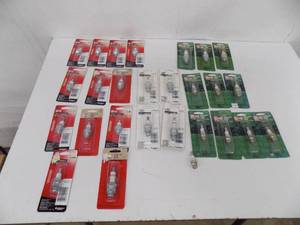 lot 158 image: 27 Champion Spark Plugs