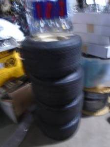 Qty of 4 golf cart tires & WHEELS. 188.50-8 . As shown.